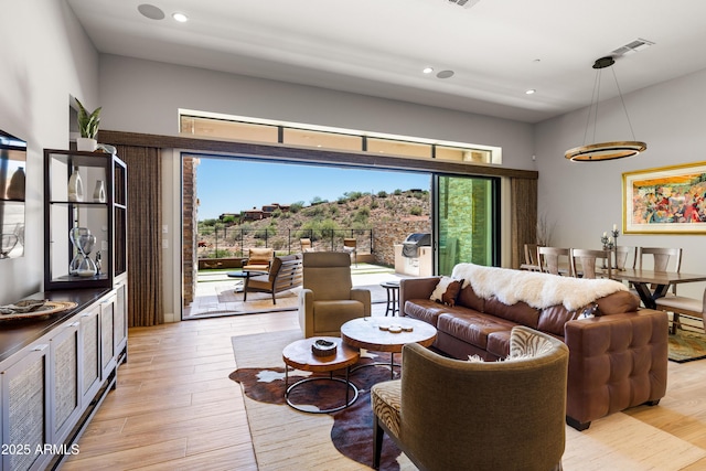 16134 E Ridgestone Dr, Fountain Hills, AZ 85268 - living room featuring light wood-style flooring and recessed lighting