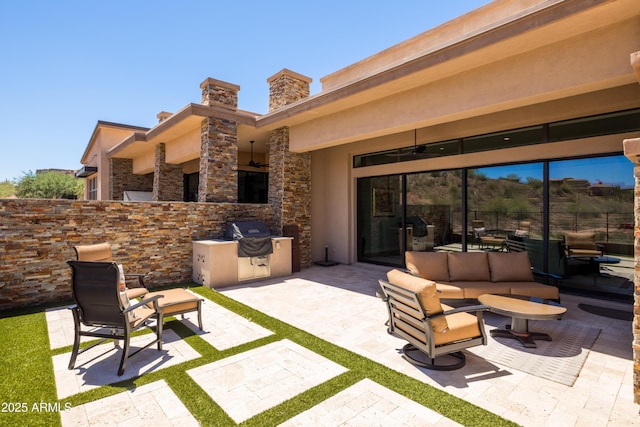 16134 E Ridgestone Dr, Fountain Hills, AZ 85268 - view of patio / terrace with area for grilling, ceiling fan, and an outdoor living space