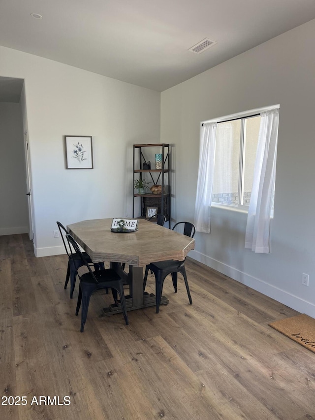 dining room featuring hardwood / wood-style floors