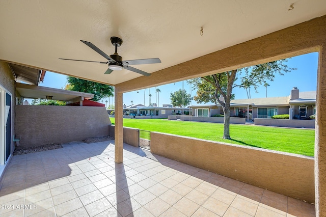 view of patio featuring ceiling fan