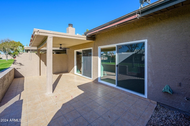 view of patio with ceiling fan