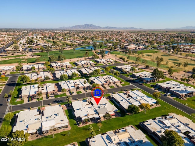 birds eye view of property featuring a water and mountain view