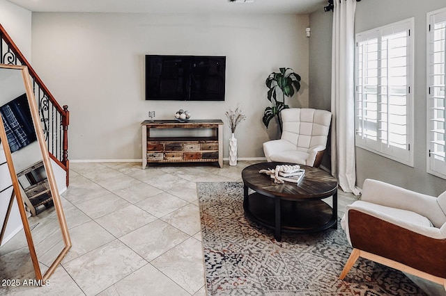 living room with light tile patterned flooring