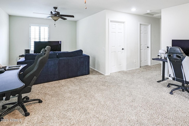 office featuring light colored carpet and ceiling fan