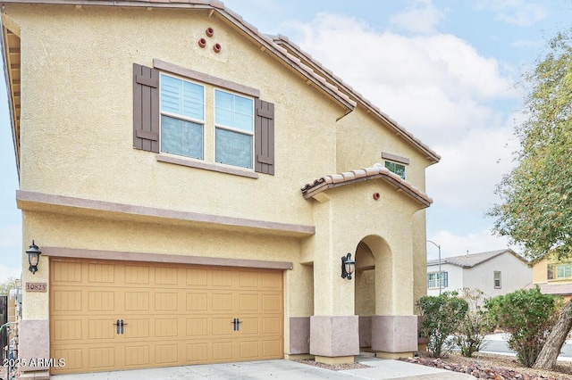 view of front of home with a garage