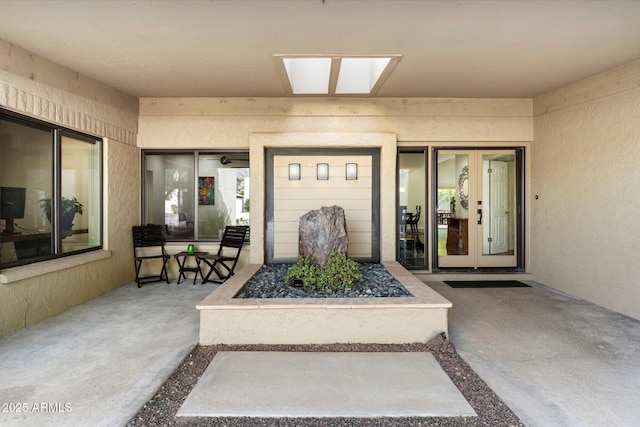 doorway to property featuring french doors and a patio