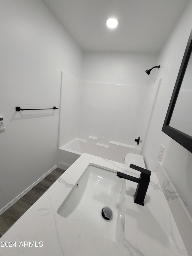 2002 W Adams St, Phoenix, AZ 85009 - bathroom featuring vanity, baseboards, and recessed lighting
