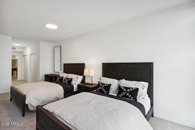 7180 E Kierland Blvd Unit 916, Scottsdale, AZ 85254 - bedroom featuring light carpet and a closet