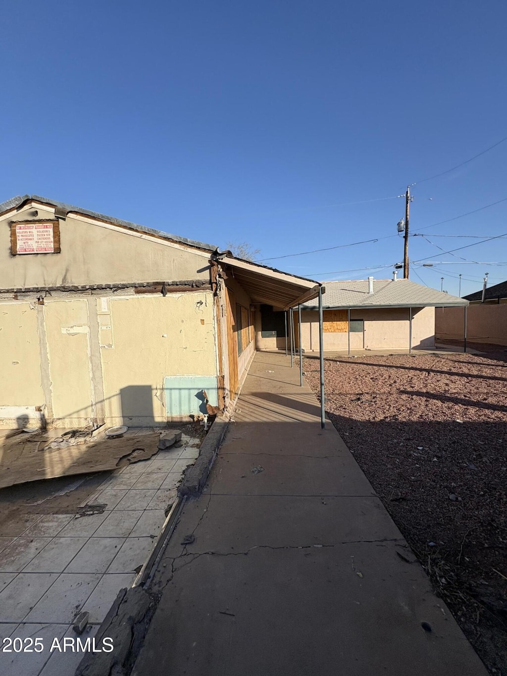 view of home's exterior featuring a patio area