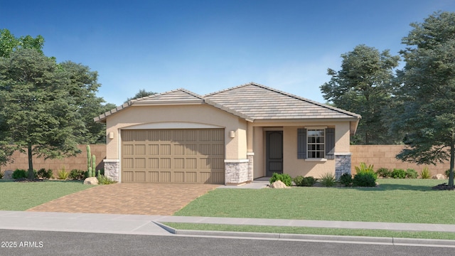 view of front of property with a front lawn and a garage