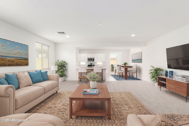 3815 S 64th Ln, Phoenix, AZ 85043 - living area with light carpet and recessed lighting