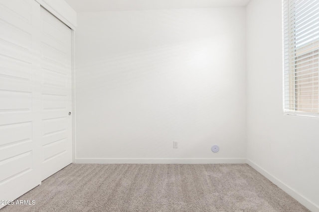 3815 S 64th Ln, Phoenix, AZ 85043 - unfurnished bedroom with carpet floors, a closet, and baseboards