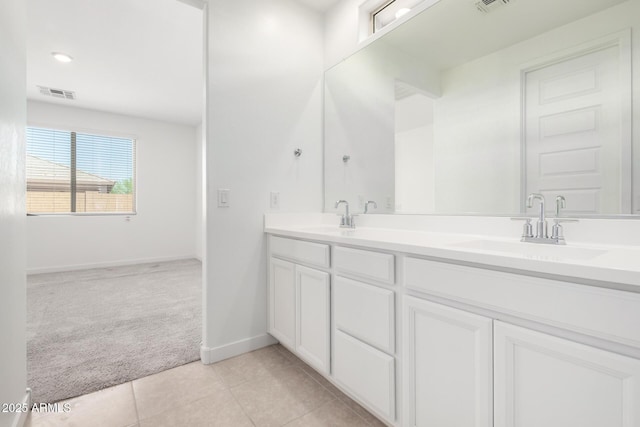 3815 S 64th Ln, Phoenix, AZ 85043 - full bathroom featuring baseboards, double vanity, and tile patterned flooring