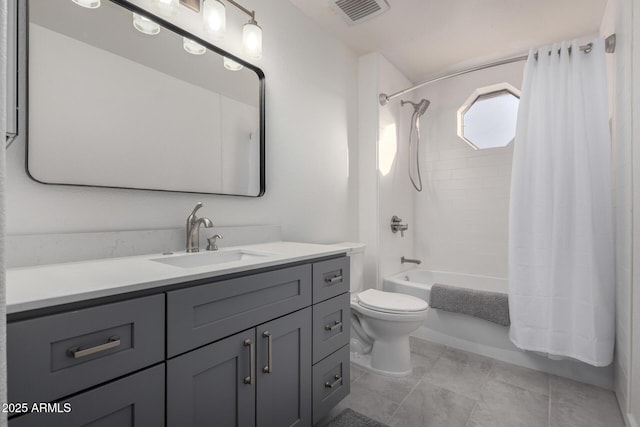 bathroom featuring visible vents, toilet, shower / tub combo, vanity, and tile patterned flooring