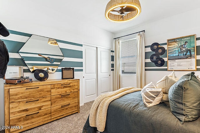 bedroom featuring a closet and carpet