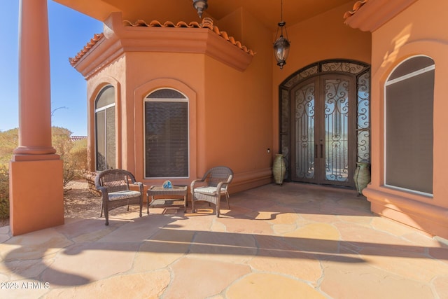 doorway to property with french doors and a patio