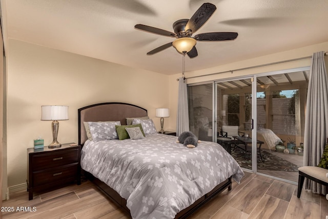 bedroom featuring access to exterior and ceiling fan