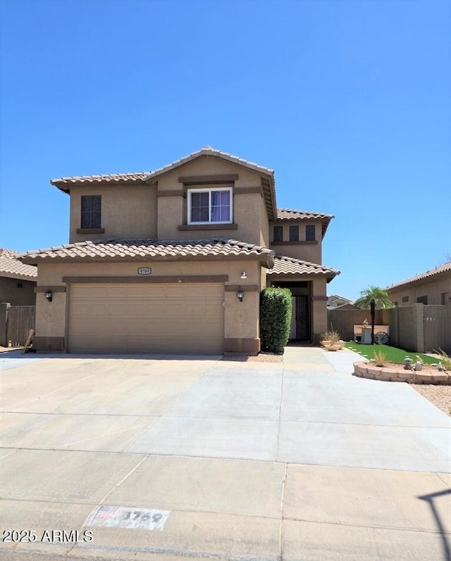 view of front of home with a garage