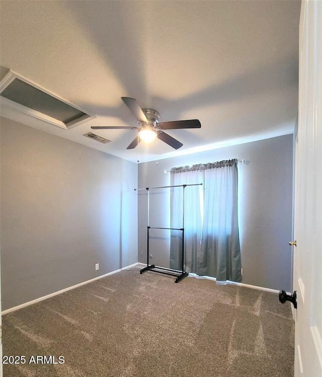 carpeted empty room with ceiling fan