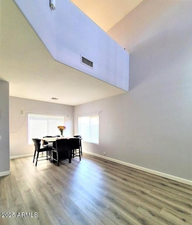 dining room with hardwood / wood-style flooring