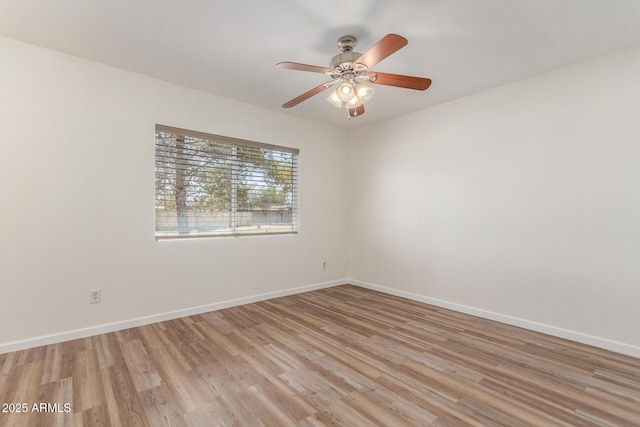 1047 W Laguna Dr, Tempe, AZ 85282 - spare room with light wood-style floors and baseboards