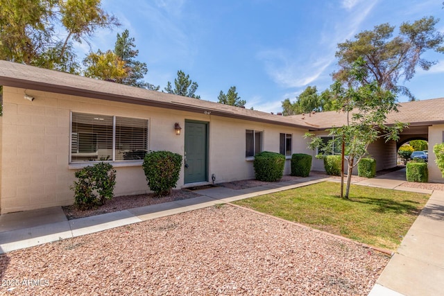 1047 W Laguna Dr, Tempe, AZ 85282 - single story home with a shingled roof and a front yard