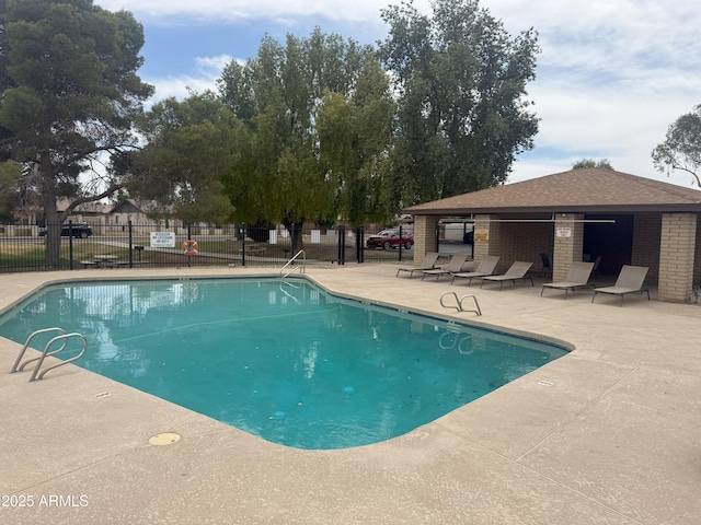 1047 W Laguna Dr, Tempe, AZ 85282 - community pool with a patio area