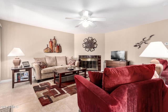 tiled living room featuring ceiling fan