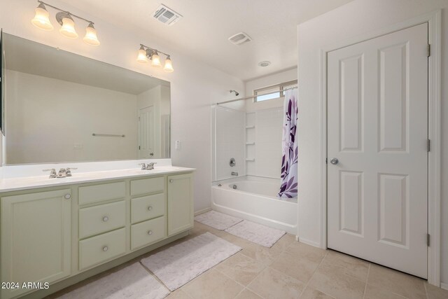 kitchen featuring sink, backsplash, a center island with sink, and stainless steel appliances