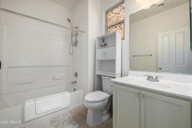 bathroom featuring visible vents, toilet, tile patterned floors, tub / shower combination, and vanity