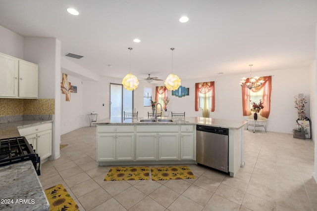 kitchen featuring sink, pendant lighting, light tile patterned floors, decorative backsplash, and dishwasher