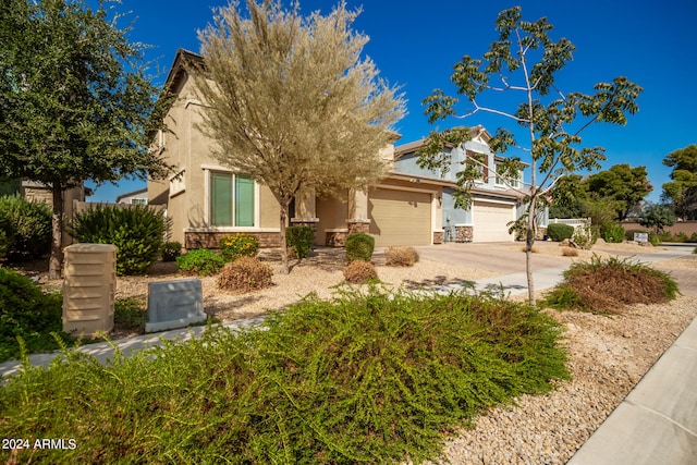 view of front of home with a garage