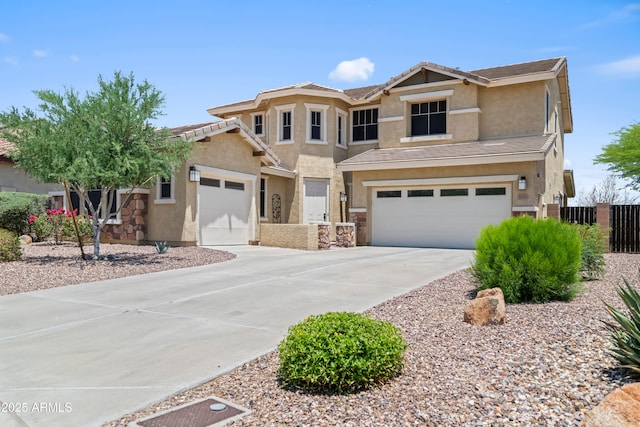 31221 N 130th Ln, Peoria, AZ 85383 - view of front of property featuring stucco siding, concrete driveway, an attached garage, and a tiled roof