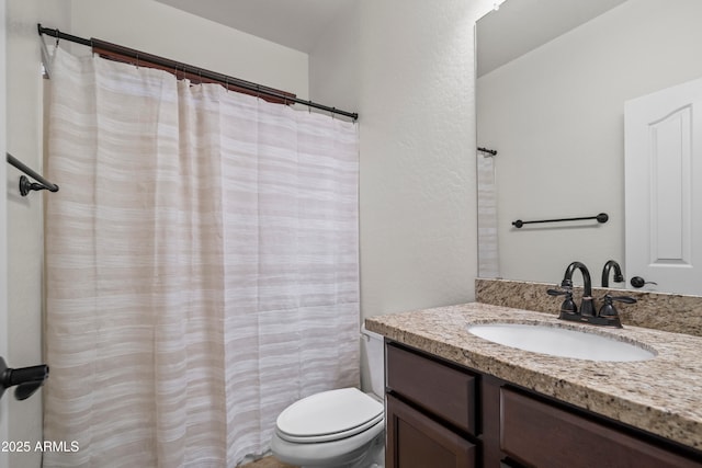31221 N 130th Ln, Peoria, AZ 85383 - bathroom with vanity, toilet, a textured wall, and curtained shower