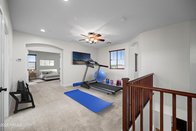 31221 N 130th Ln, Peoria, AZ 85383 - exercise area with carpet flooring, arched walkways, recessed lighting, a ceiling fan, and baseboards