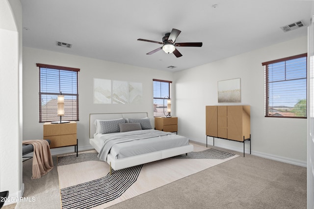 31221 N 130th Ln, Peoria, AZ 85383 - carpeted bedroom with baseboards and ceiling fan