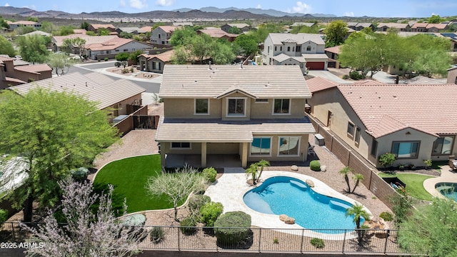 31221 N 130th Ln, Peoria, AZ 85383 - view of swimming pool with a fenced backyard, a residential view, a patio area, and a mountain view