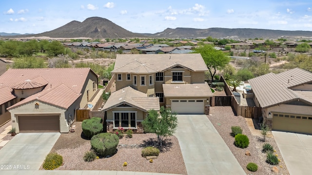 31221 N 130th Ln, Peoria, AZ 85383 - view of front of property with driveway, stucco siding, a residential view, and a garage