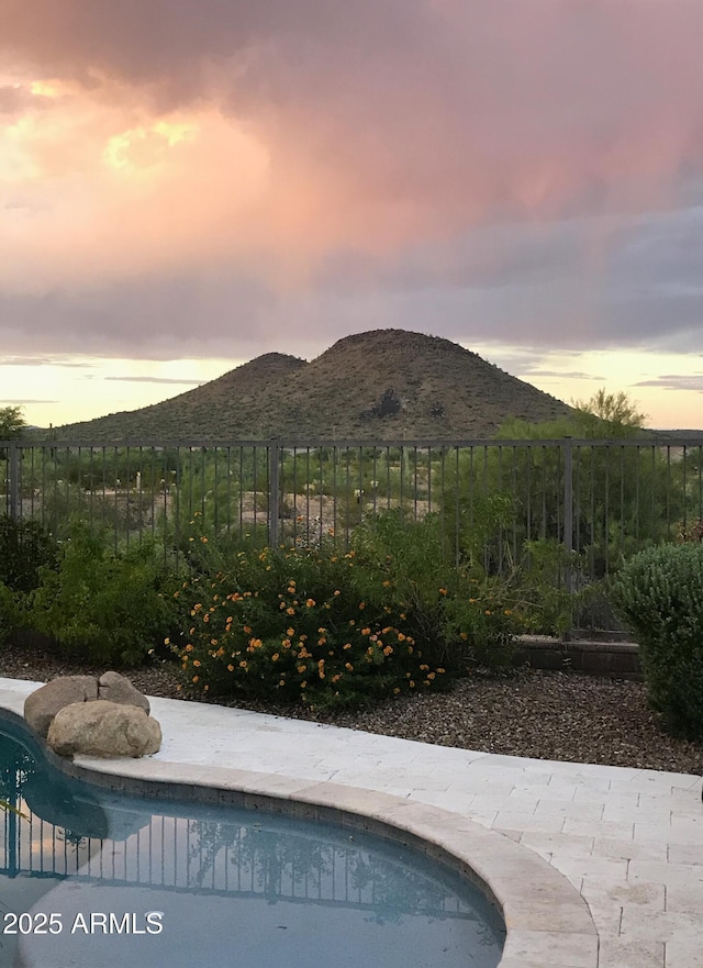 31221 N 130th Ln, Peoria, AZ 85383 - pool at dusk with a mountain view