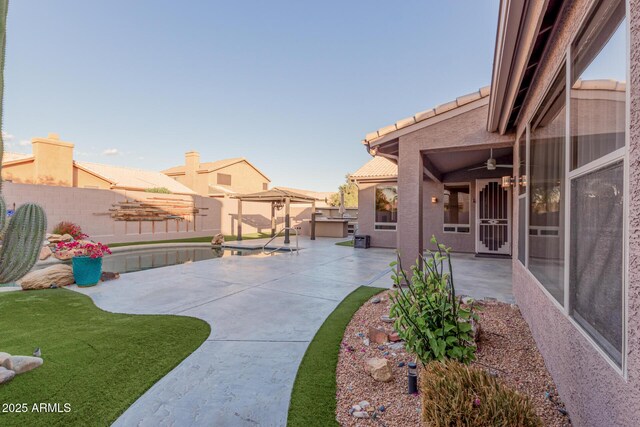 view of yard with a fenced backyard and a patio area