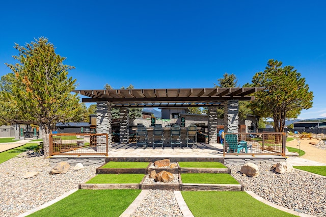 view of patio / terrace with an outdoor bar