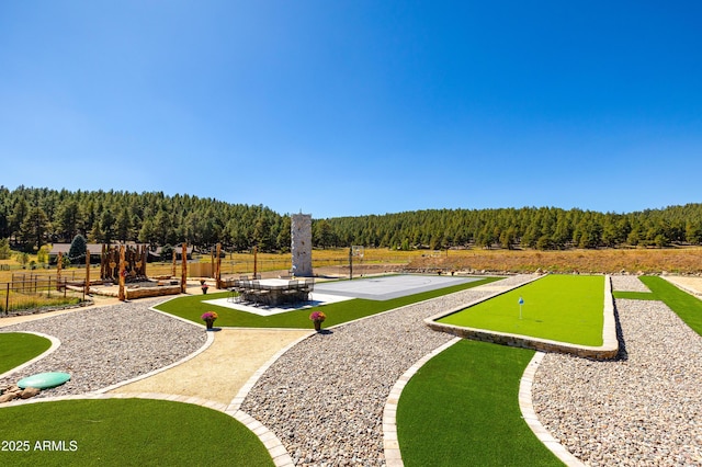 view of home's community with a patio area