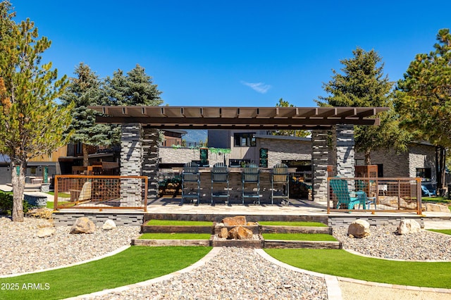 view of patio / terrace featuring an outdoor bar