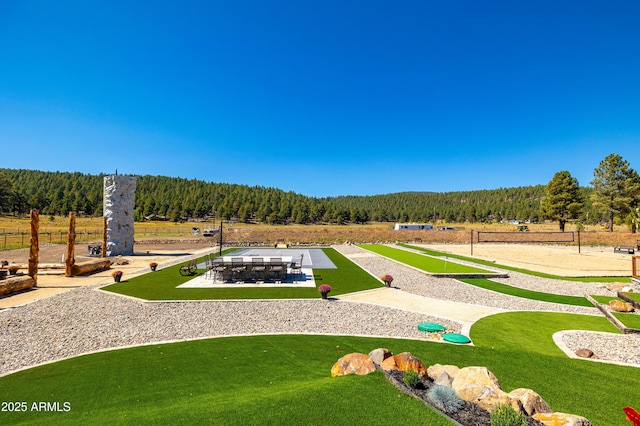 view of property's community featuring volleyball court