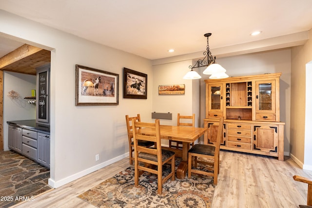 dining room with light hardwood / wood-style floors