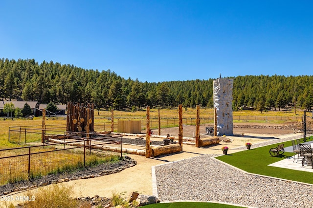 exterior space with a lawn and a rural view