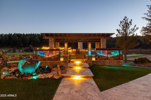 view of front of home featuring a pergola