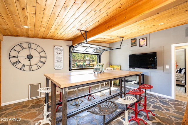 dining area with wood ceiling