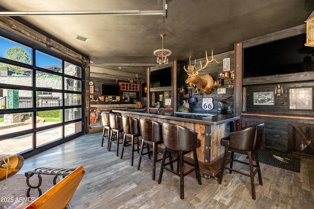 bar featuring wood-type flooring