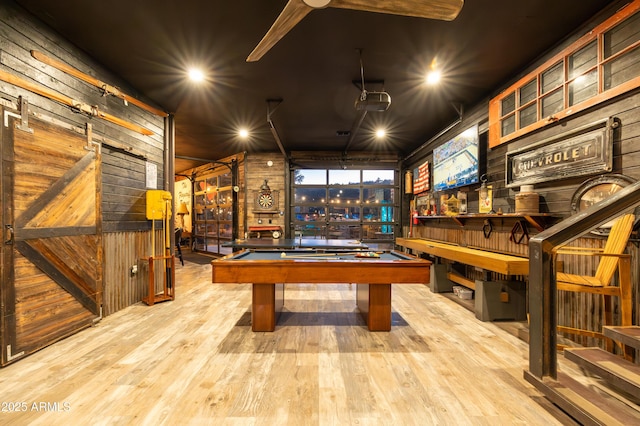 recreation room with billiards and light wood-type flooring